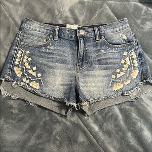 Cut-off Denim Shorts with Embroidered Embellishments